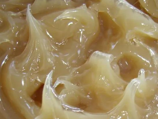 Close-up texture of high-consistency lithium industrial grease supplied by Morgan